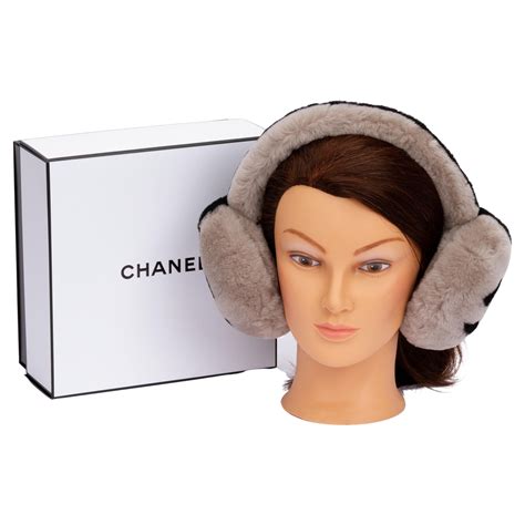 why does chanel always wear earmuffs|Chanel number 3 earmuffs.